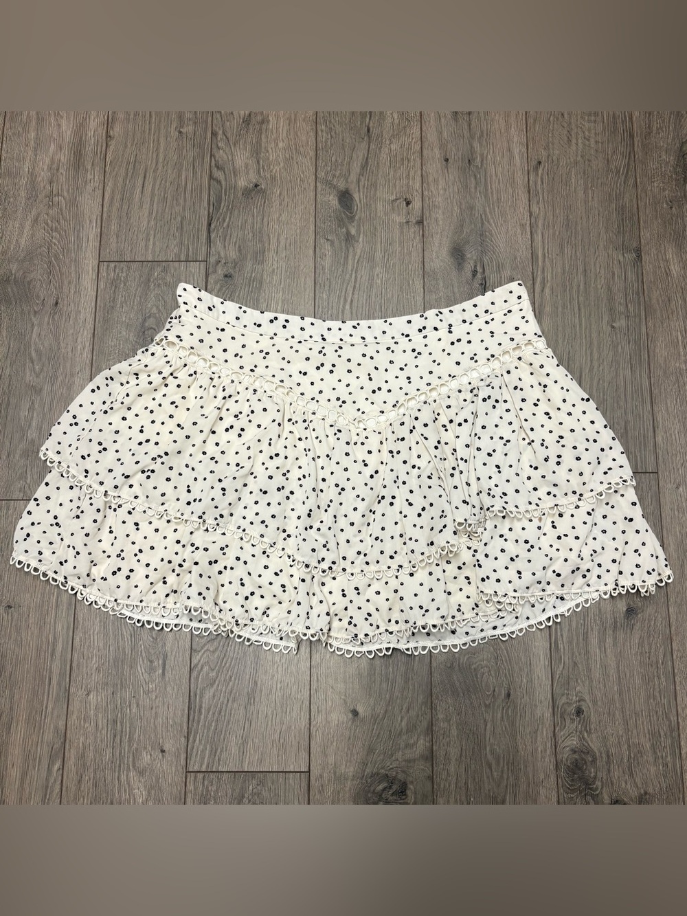 Pleated floral mini skirt